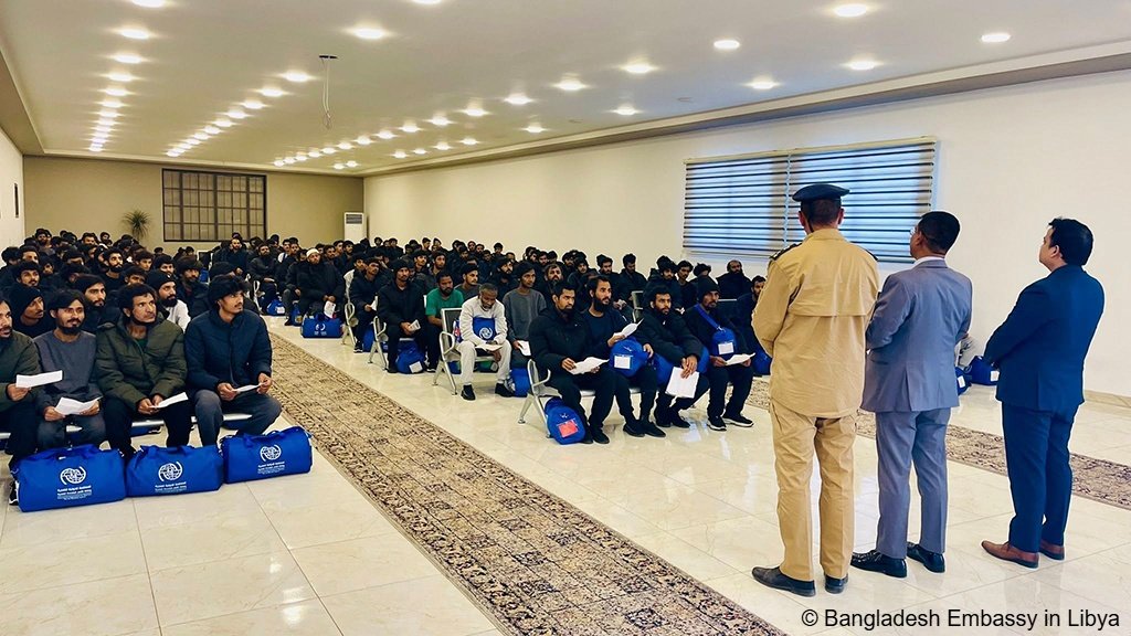 The Bangladeshi nationals who left Libya on Monday, June 16 wait in a hall before boarding their flight from Tripoli in Libya via Muscat in Oman to Dhaka, the capital of Bangladesh |  Photo: Bangladeshi Embassy in Libya