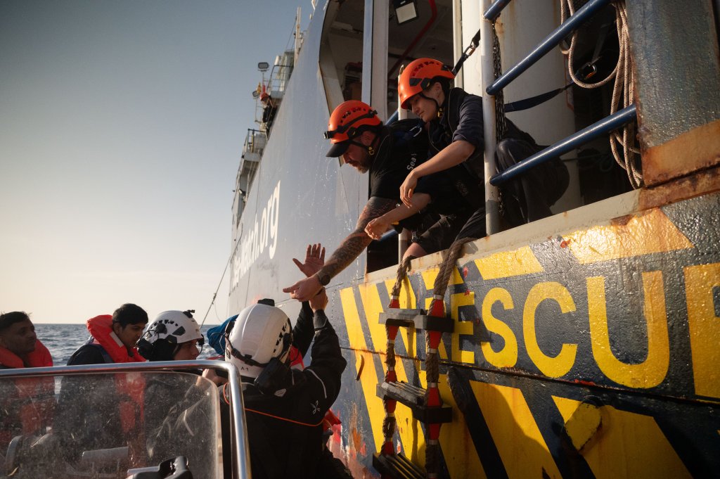 The attack took place just after some of the 90 people rescued on May 11 are brought on board the Sea-Watch 5 with the help of crew members | Photo: Leo Spartacus / Sea-Watch 5 press office