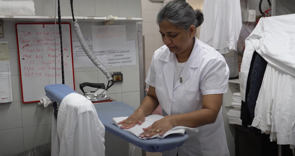 Upa, as she likes to be known, is now working in the laundry department of the Grand Hotel and says the job makes her very happy | Photo: Screenshot promotional video Progetto Integra