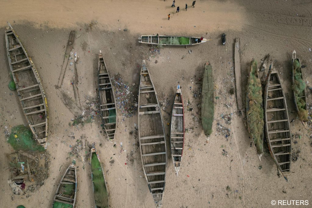 A drone view shows rows of fishermen's boats, known as pirogues, on the shore at Fass Boye, Senegal, February 1, 2024. | Photo: REUTERS/Zohra Bensemra