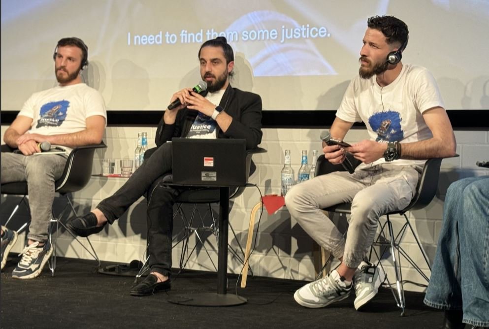 Ibrahim (on the right) together with Tareq Alaows, spokesperson for Pro Asyl (and another Pylos survivor during a public discussion at Rosa Luxemburg Foundation in Berlin on the first-year anniversary of the Pylos shipwreck | Photo: Ana P. Santos/InfoMigrants