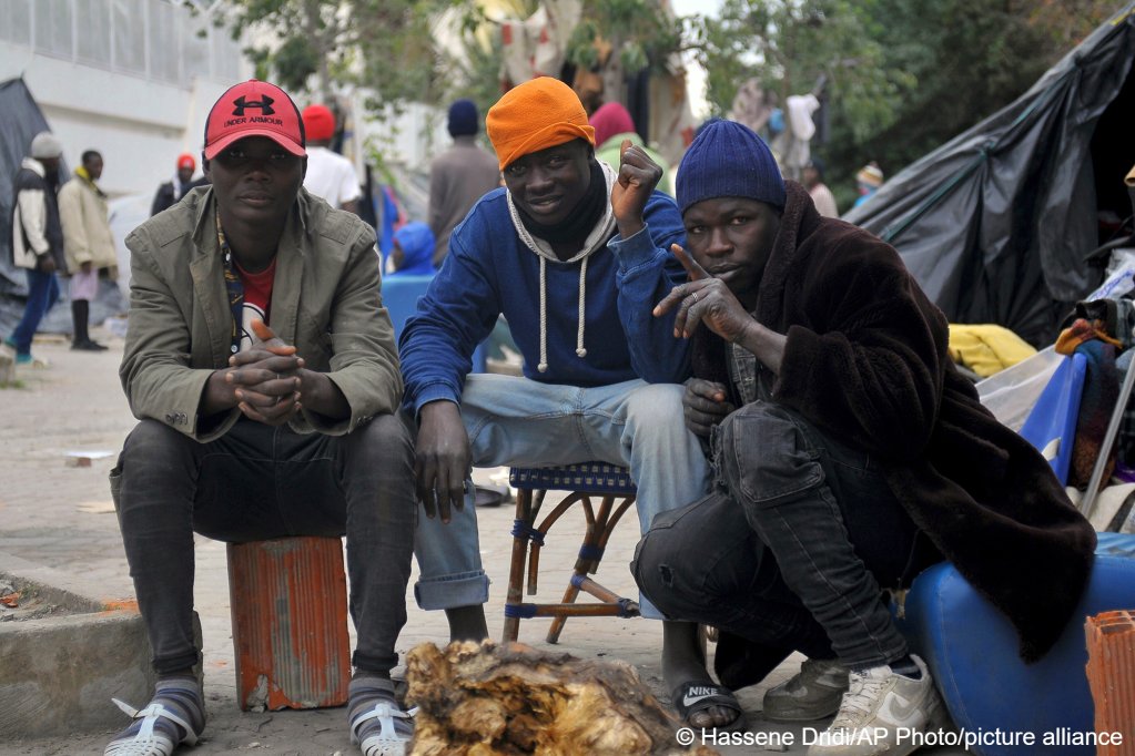 Sub-saharan migrants camped in front of the IOM office in Tunis, Tunisia on March 2, 2023 seeking protection from violence | Photo: Hassene Dridi/AP