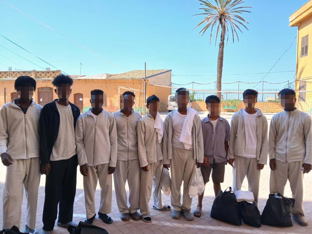 Rahim* and fellow unaccompanied minors in the courtyard of the home where they are staying in Sicily | Photo: Alessandro Puglia / InfoMigrants