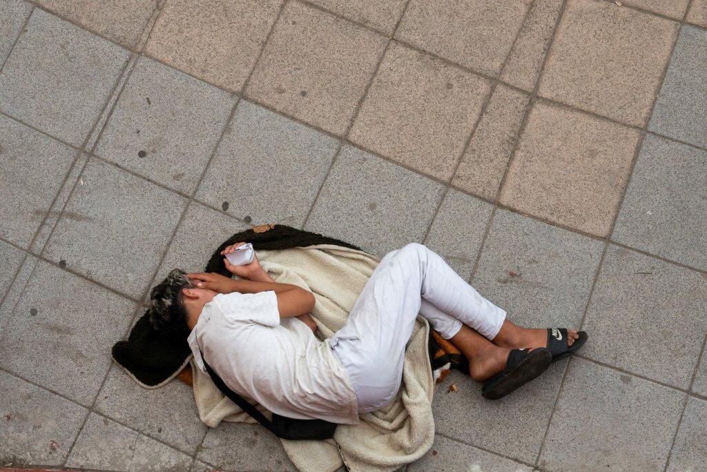 Migrants are seen sleeping on the streets of Ceuta or in camps along the the enclave's beaches | Photo: Reuters