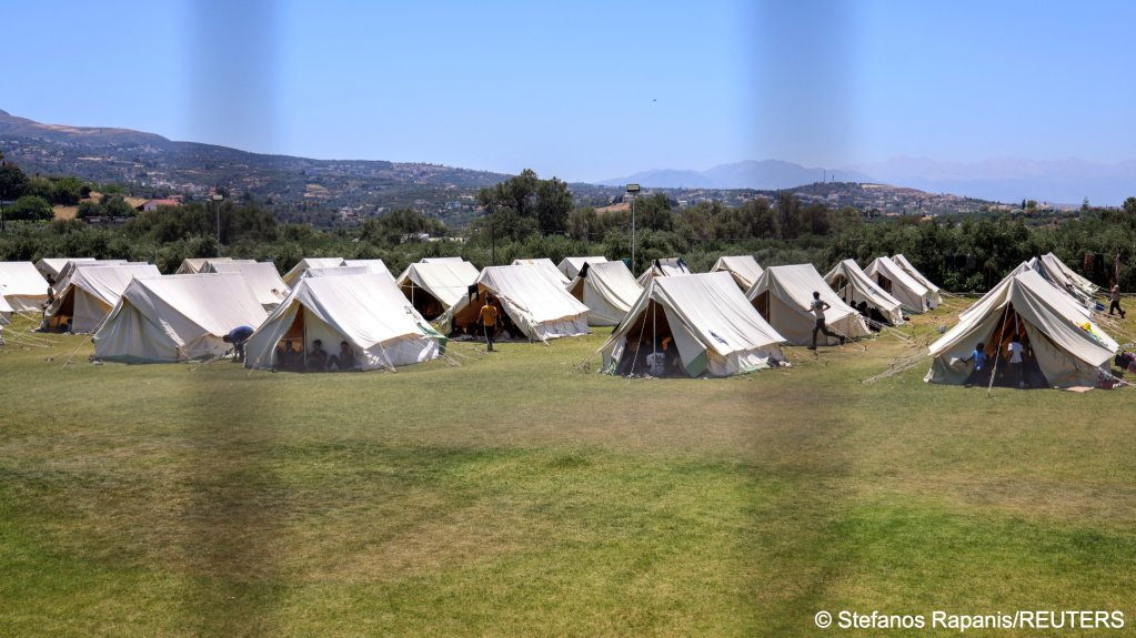 The emergency tents erected on the stadium pitch are only an emergency measure | Photo: REUTERS/Stefanos Rapanis