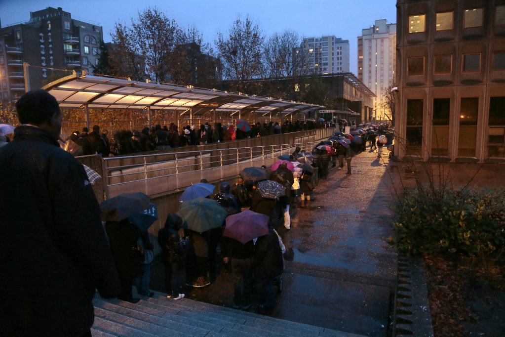 File photo: Life can be difficult if you don't have the correct papers in France, like for these people queuing at the prefecture in Paris in 2012 | Photo: AFP