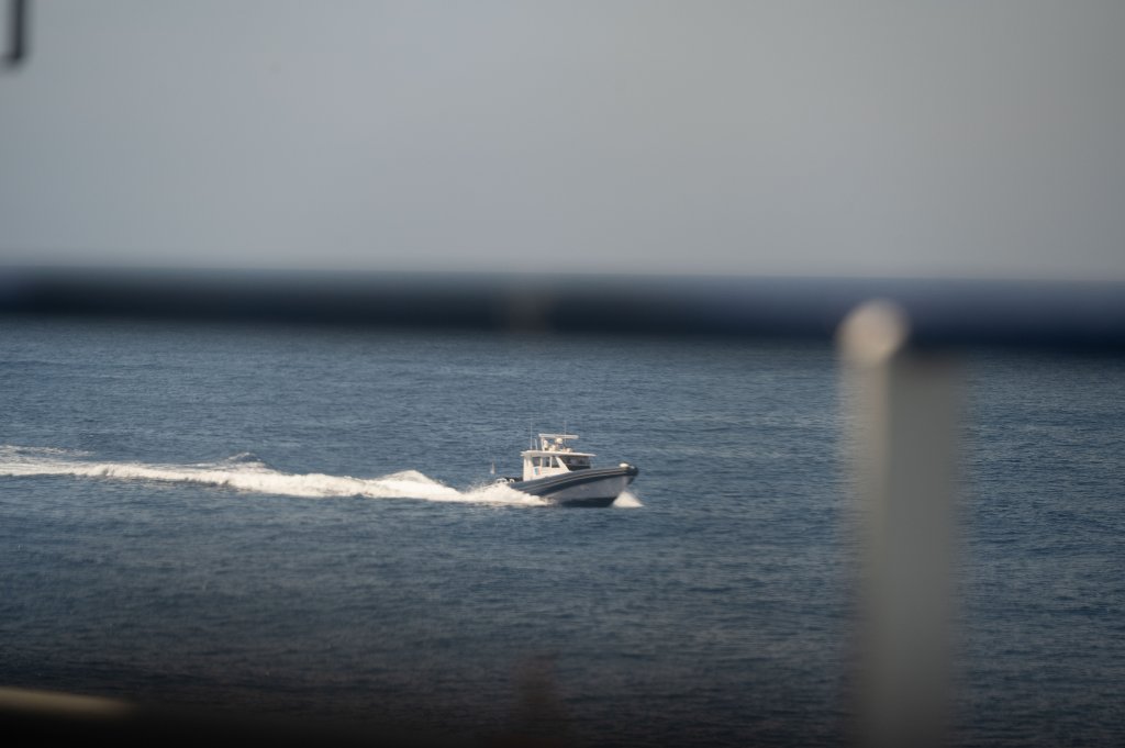 A small fast ship, allegedly part of the Libyan Coast Guard approaches the Sea-Watch 5, those on board threaten the crew with 'violence' if they don't stop | Photo: Leo Spartacus / Sea-Watch press office