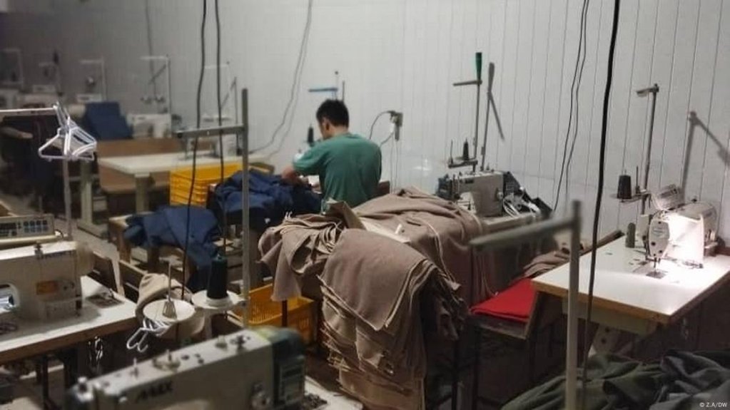 Undocumented migrants are frequently exploited for cheap labor, such as Shahab, seen here, a former Afghan army commander now working in a clothing factory in Iran | Photo: Z.A / DW