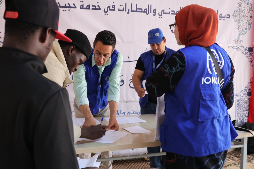 Des migrants béninois profitent du programme de retours volontaires de l'OIM, en Tunisie le 28 mai 2024. Crédit : OIM Tunisie