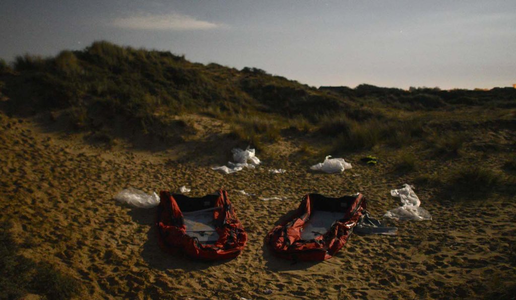 From file: Two migrant dinghies abandoned on a beach near Wimereux. Photo taken on the night between September 1 and 2, 2020. Credit: Mehdi Chebil