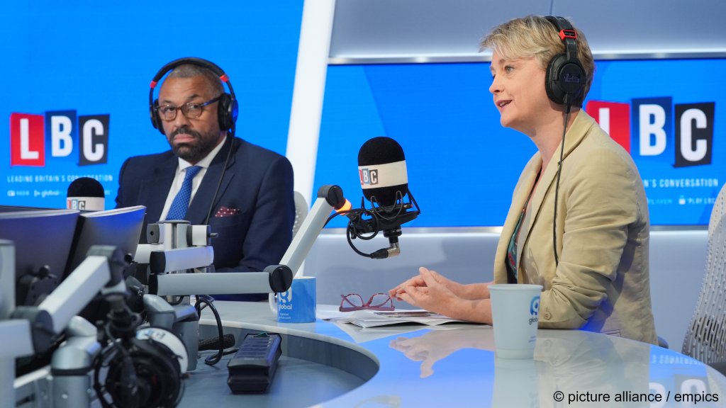 From file: The former Home Secretary James Cleverly (L) and current Home Secretary Yvette Cooper (R) debating their roles in June 2024 before the election, when Cleverly was serving Home Secretary and Cooper the Labour shadow Home Secretary | Photo. Jonathan Brady / empics / picture alliance
