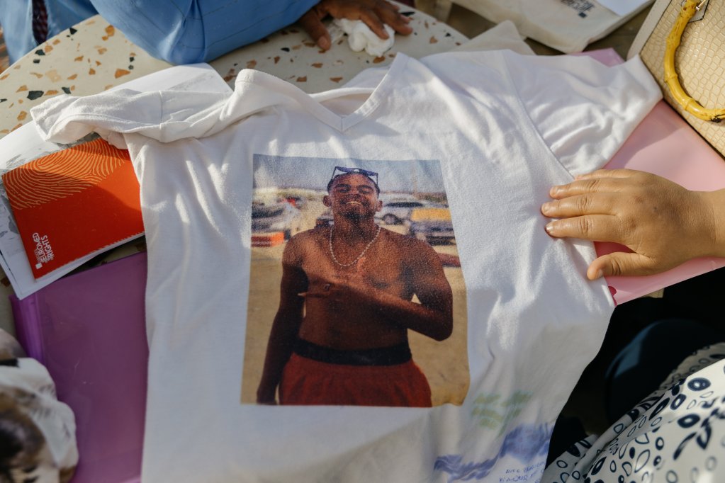 Fatima had a T-shirt printed with the photo of her son, Ashraf Charabi, who went missing on the journey to Europe | Photo: Valentina Camu (Divergence)