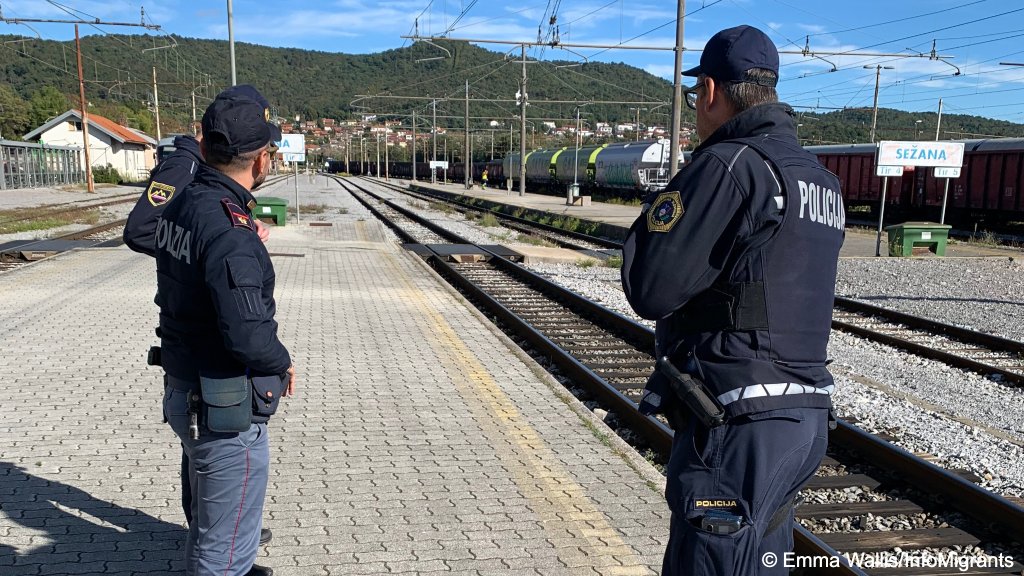 Members of the joint patrol wait on the station for the next train to arrive | Photo. Emma Wallis / InfoMigrants
