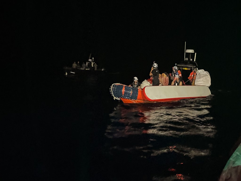 Unidentified boat with armed men threatening the rescue crew of the Sea-Watch 5 in the late hours of 13 August 2026 when the Sea-Watch 5 rescued six people in international waters | Photo: Géraldine Morat Hofmaier / Sea-Watch