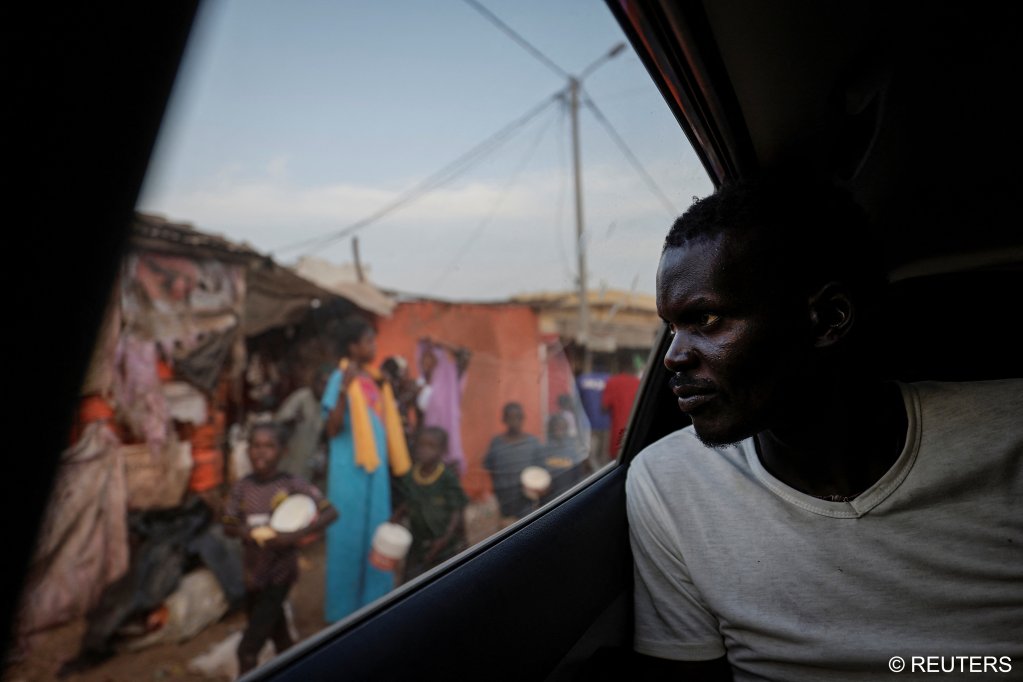 Fisherman Birane Mbaye looks out of a car window in Fass Boye, Senegal, March 19, 2024 | Photo: REUTERS/Zohra Bensemra