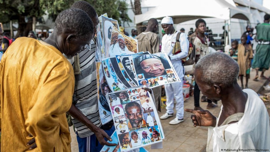 Religious leaders, including marabouts, sell their services on markets across Senegal | Photo: Muhamadou Bitty/AFP