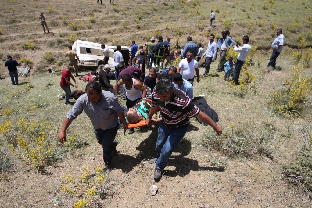 From file: Turkish emergency services members carry injured at the scene of a bus accident in Van, Turkey, 18 July 2019. According to reports, 15 undocumented migrants died in the incident | Photo: EPA/OZKAN BILGIN