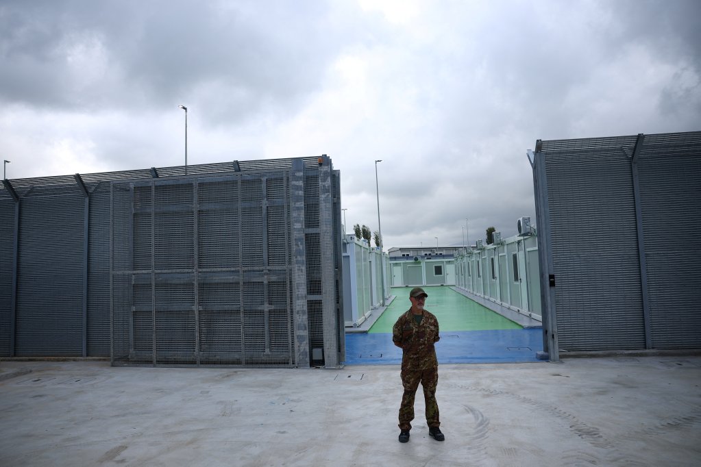 The camp in Gjader, Albania, has been compared to a prison-like facility though Italian Interior Minister Matteo Piantedosi has referred to the center as "light detention" | Photo: Florion Goga / Reuters