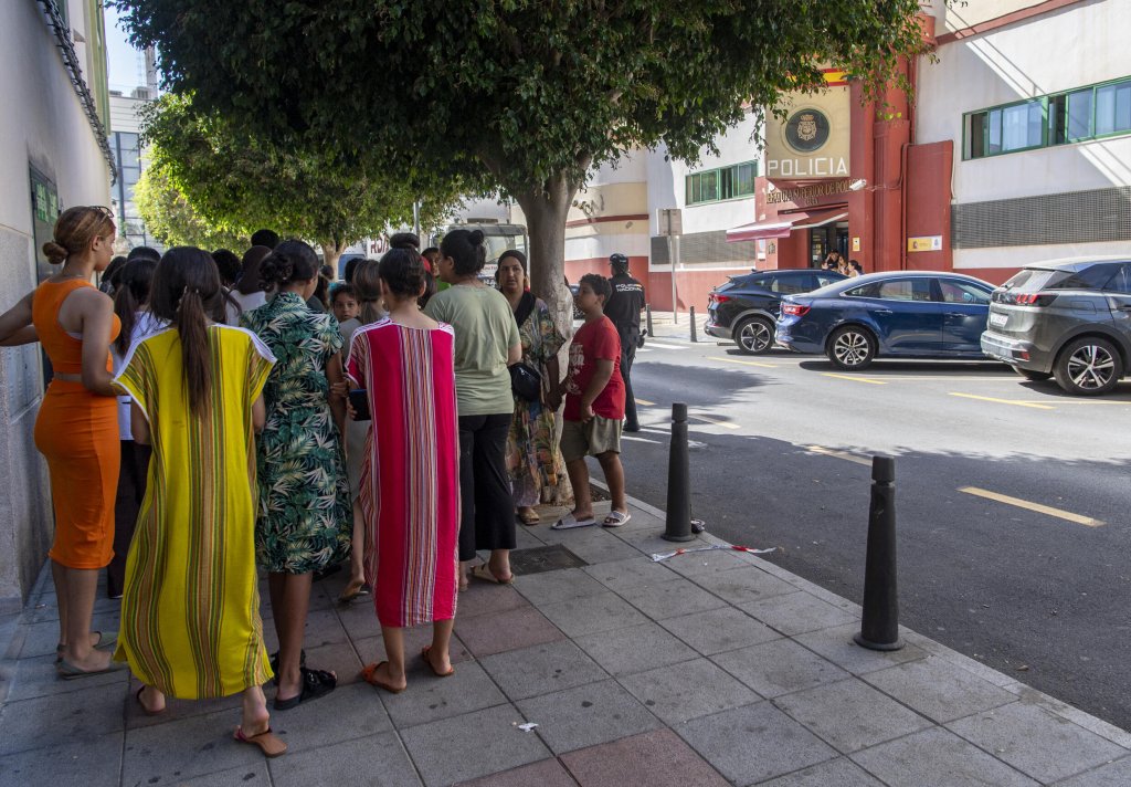 Migrants awaiting identification and registration procedures in Ceuta, August 7, 2026.