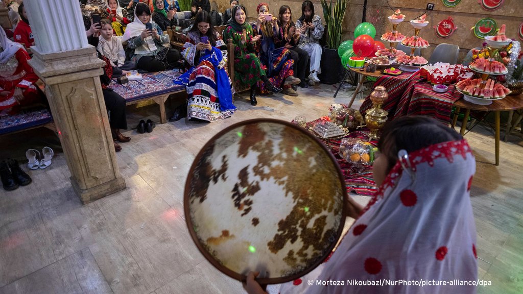 From file: A young Afghan refugee plays traditional Iranian music in Iran to celebrate Yalda. | Photo: Morteza Nikoubazi / picture alliance / NurPhoto