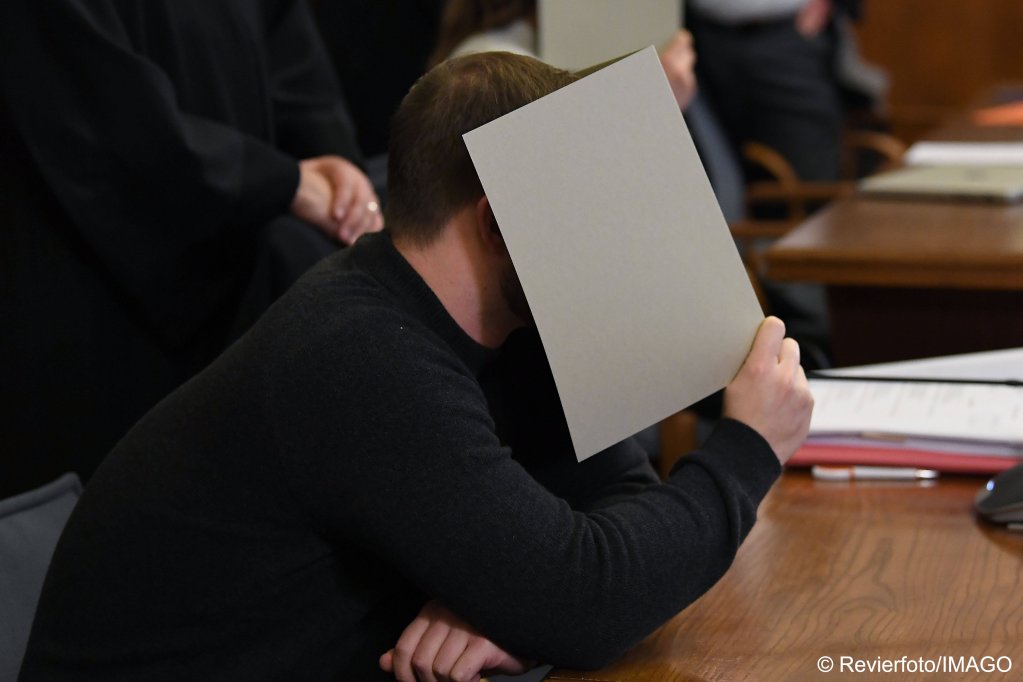 The accused covered their faces as the trial got underway on Tuesday, December 19, 2023 | Photo: Imago