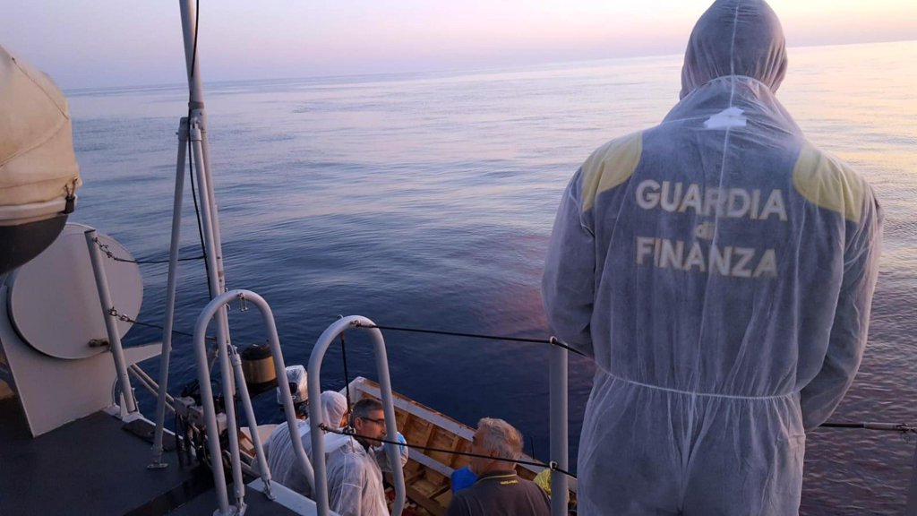 The Guardia di Finanza - one of Italy's police corps - searches for migrants at sea. Credit: ANSA/UFFICIO STAMPA GUARDIA DI FINANZA
