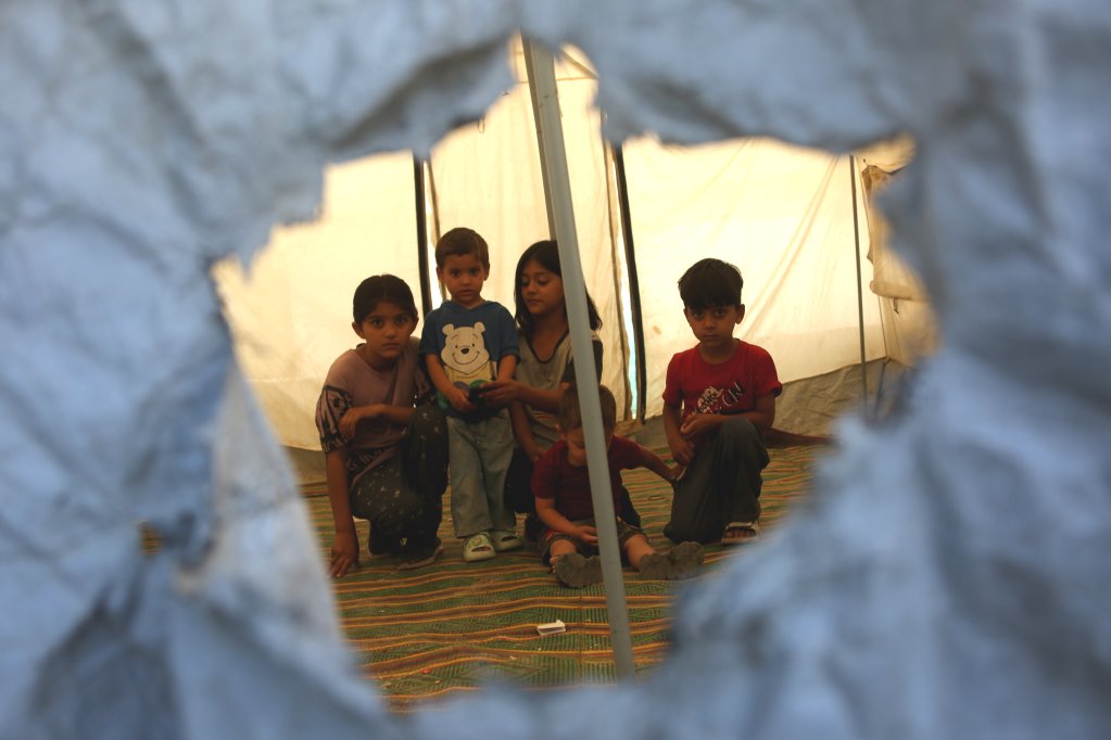 File photo: Afghan children are seen at a temporary camp in Kabul in June 2025, many of these people in the camp were expelled from neighboring Pakistan and Iran that same year | Photo: Saifurahman Saf/Xinhua / picture alliance
