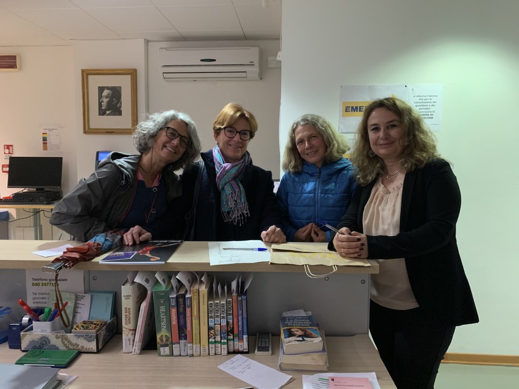 Volunteers teach Italian to migrants, asylum seekers and refugees twice weekly between October and May each year. Here from L some of the 33 volunteers, Marta, Maria, Manuela and Serena | Photo: Emma Wallis / InfoMigrants