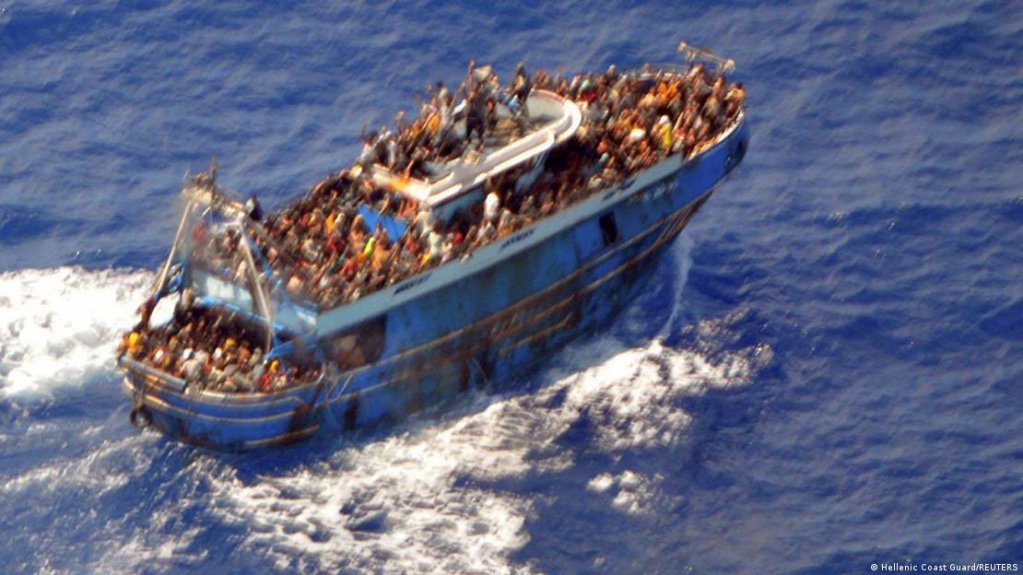 This picture of the dangerously overloaded boat was taken by the Greek coast guard before it capsized