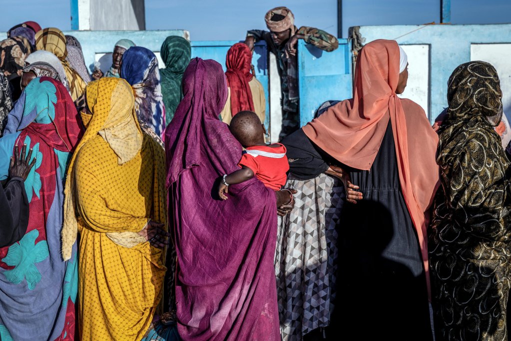 File photo used as illustration: Sudanese refugees queue to register with the UN refugee agency UNHCR in a transit camp in Tine, Chad in November 2025 | Photo: Joris Bolomey / AFP