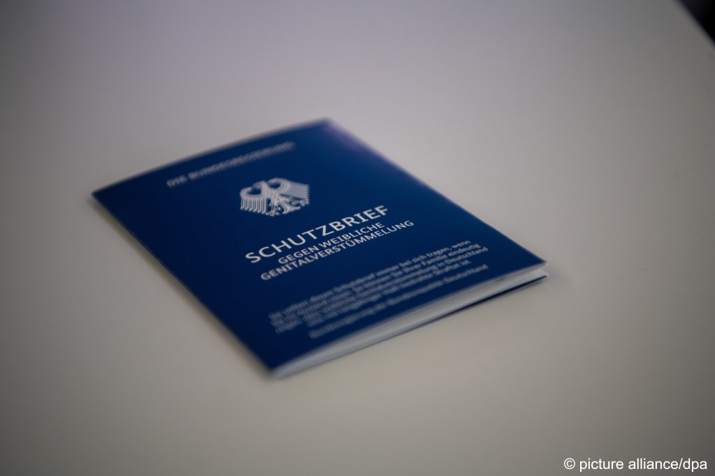 The passport style protection letter is designed for girls at risk of genital mutilation to carry it with them while traveling to their home country from Germany. | Photo: picture alliance/dpa: Dorothee Barth
