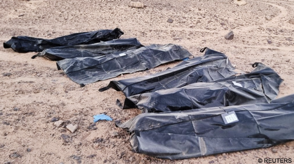 File photo: Bodies of migrants lie in bags after they were discovered in a mass grave north of Kufra City, Libya February 13, 2025 | Photo: Reuters