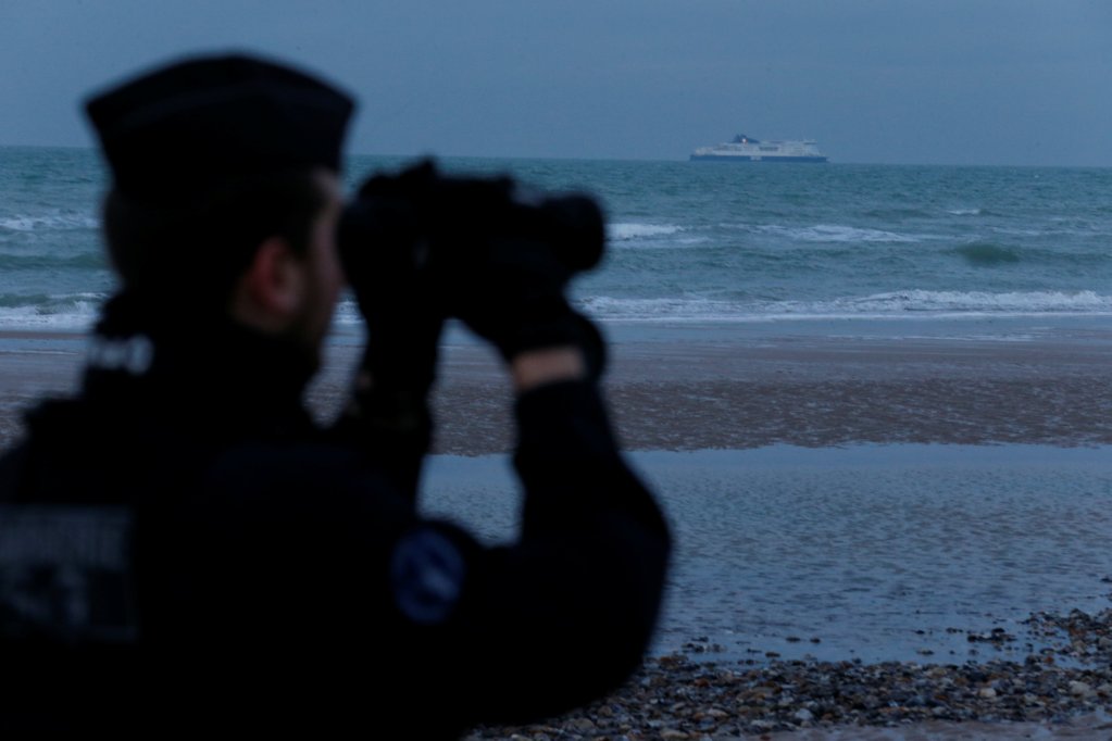 From file: A policeman on patrol on the coast of Calais | Photo: Reuters