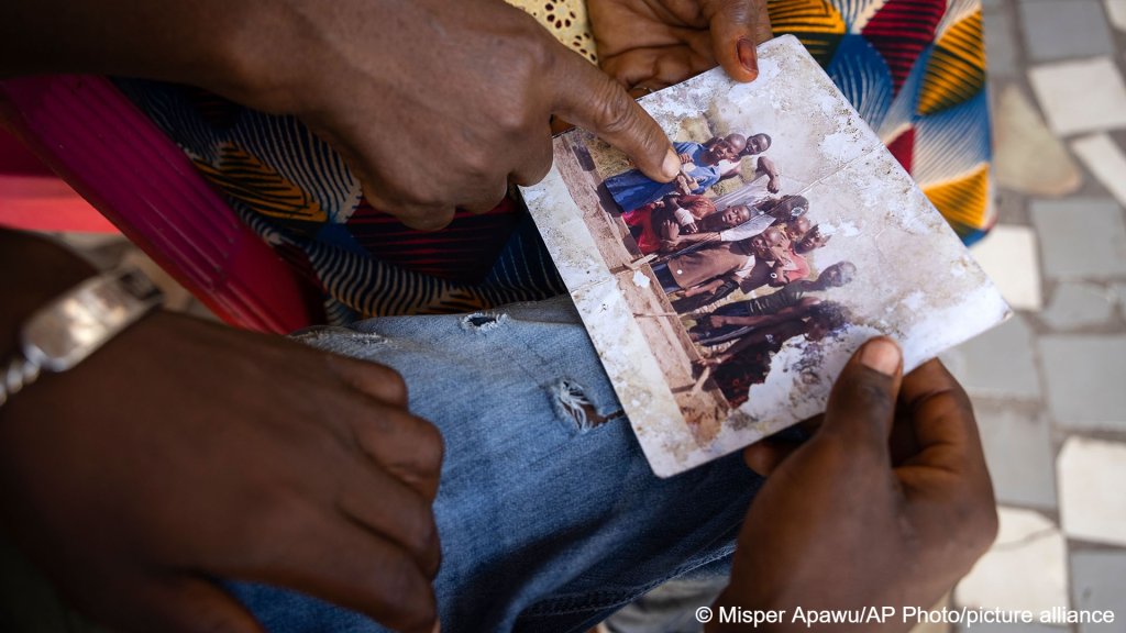 This childhood group photograph of Ousmane Sylla (in the blue shirt) shows the migrants during happier times | Photo: AP Photo /MisperApawu