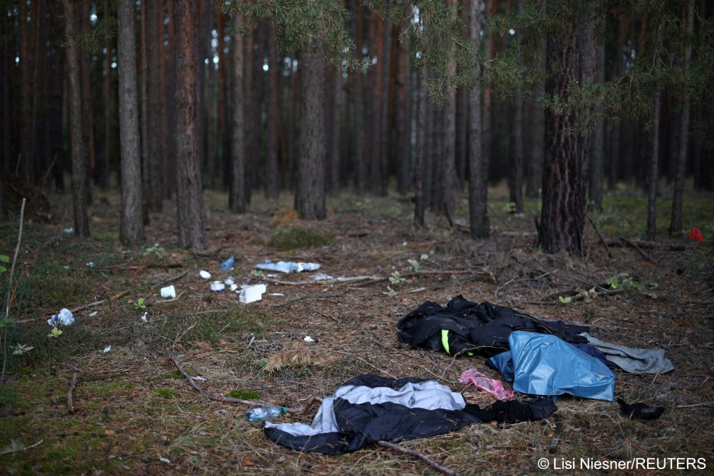 From file: A general view of a site in the forest where the police found belongings left behind by migrants as they patrolled along the German-Polish border in 2023 | Photo: Lisi Niesner/Reuters