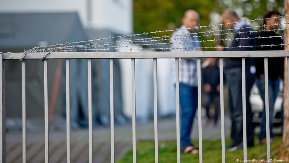 A fence outside a center for asylum seekers in Germany | Photo: Picture-alliance/dpa/D.Karmann