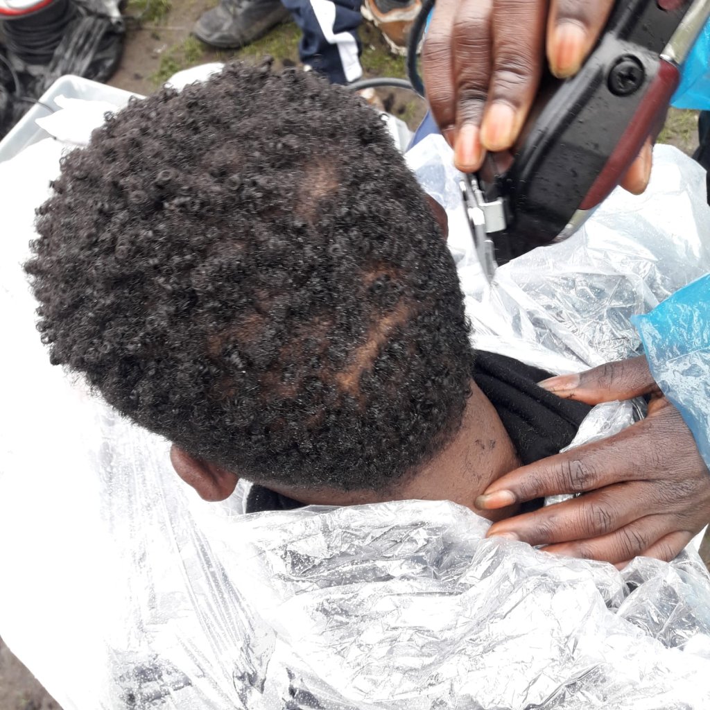 The haircutting station is popular among migrants | Photo copyright: Care4Calais, January 2021