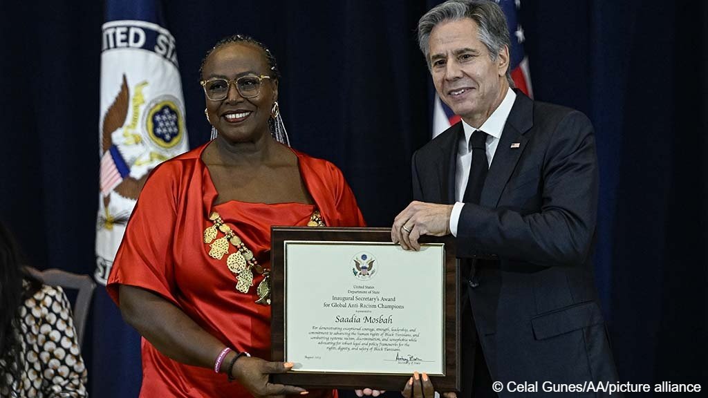 File photo: Tunisian activist Saadia Mosbah receives an award from US Secretary of State Anthony Blinken in August 2023 for her anti-racism work | Photo: Celal Gunes / Anadolu Agency / picture alliance
