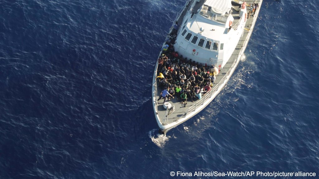 File photo: Migrants are seen sitting on the deck of a Libyan coast guard ship after being intercepted while trying to cross the Mediterranean Sea on a rubber boat to Europe in October 2022 | Photo: Fiona Alihosi /picture-alliance/AP Photo/Sea-Watch