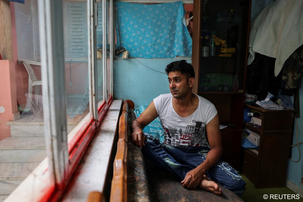 Many families like Adil Hussain from Pakistan have not heard from their loved ones since the sinking of a fishing boat off Greece in June | Photo: Stelios Misanas / Reuters