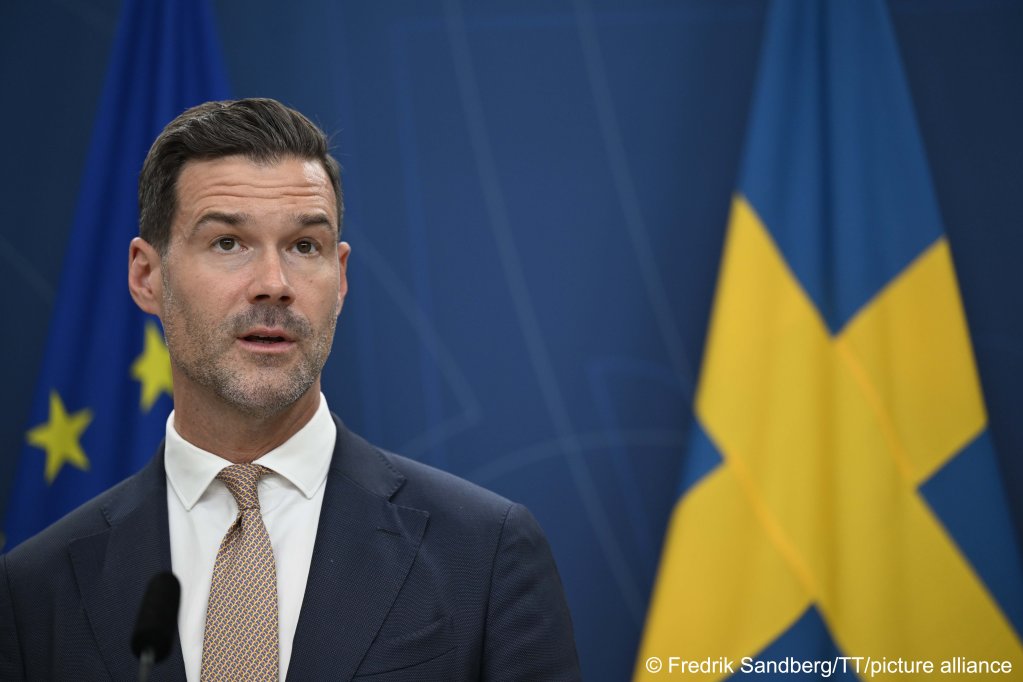 Sweden's Migration Minister Johan Forssell has championed the government's restrictive 'era of deportation' agenda, including the controversial 'snitch law' requiring six authorities to report undocumented migrants and a new law abolishing permanent residence permits for refugees | Photo: Fredrik Sandberg / picture alliance