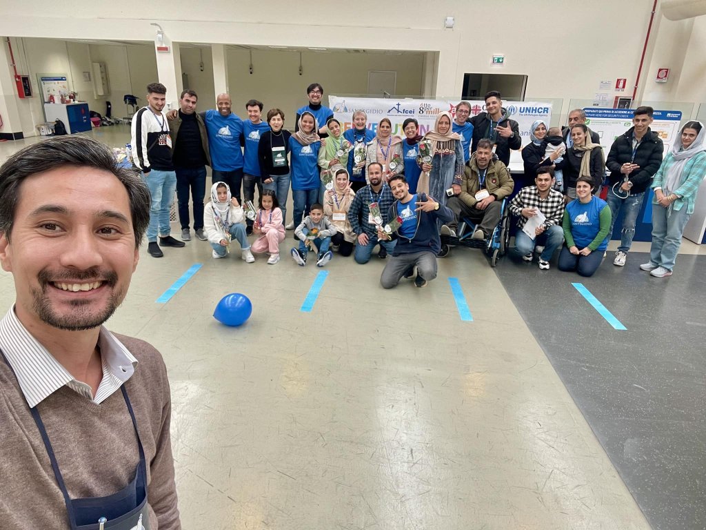 Ali (L) from Afghanistan works with Sant'Egidio to help welcome other Afghans as they arrive at Rome's Fiumincino airport | Photo: Community of Sant'Egidio Press Office