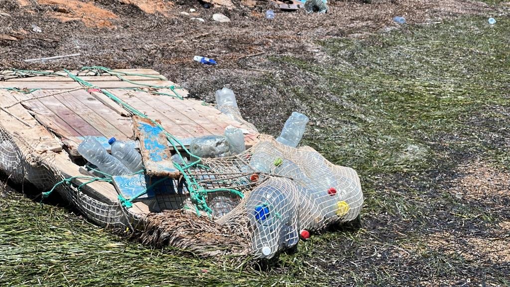 A boat abandoned by migrants on the shore of the Kerkennah Islands. | Photo: Rashdi Khazir