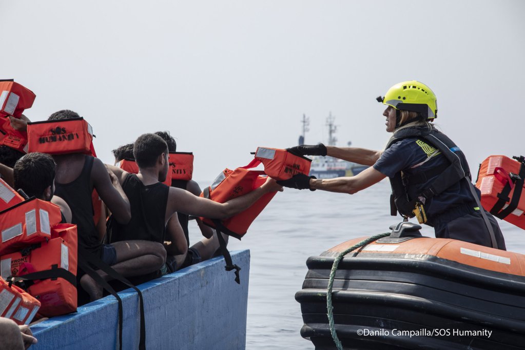 From file: The crew of the SOS Humanity SAR vessel rescuing around 60 people from distress in the Central Mediterranean on August 23, 2023 | Photo: Danilo Campailla/SOS Humanity