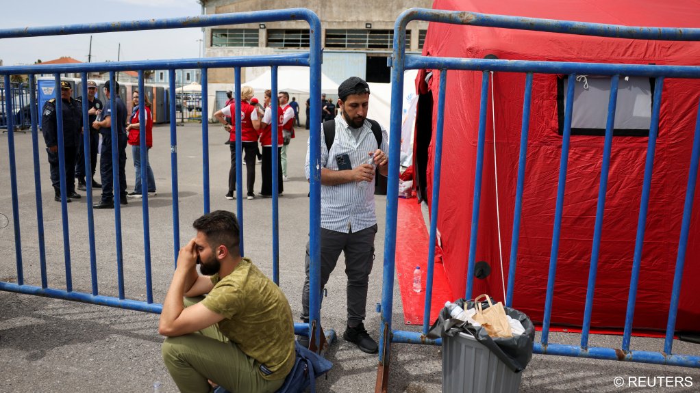 Syrian Kassam Abozeed, 34, who says his wife Esraa and brother-in-law were onboard a boat with migrants that capsized at open sea off Greece, is seen at the port of Kalamata, Greece, June 15, 2023 | Photo: Stelios Misina / Reuters