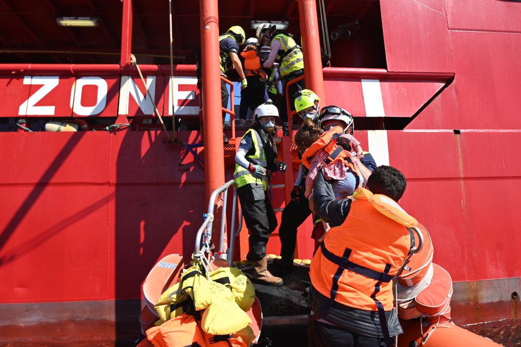 Some of the 64 survivors the Ocean Viking crew rescued from a wooden boat in distress on May 23, 2022 board the NGO vessel | Photo: Candida Lobes/SOS Mediterranee