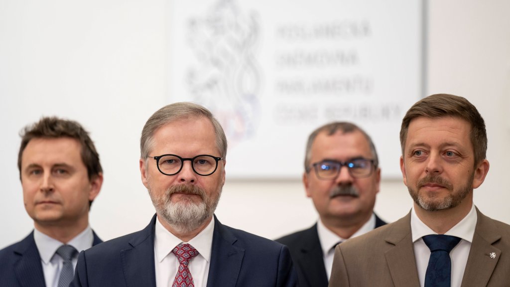 Prime Minister Petr Fiala 2nd from left and Interior Minister Vit Rakusan right and group of coalition MPs hold press conference on current steps to tighten Czech migration policy on March 7, 2025 | Photo: Ondrej Deml / Imago