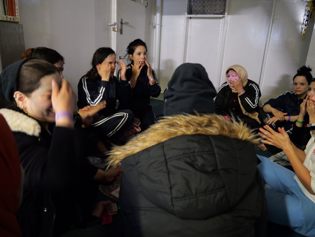 Women on board the Geo Barents participate in a beauty and wellness session | Central Mediterranean Sea, February, 2024 | Photo: Sou-Jie van Brunnersum