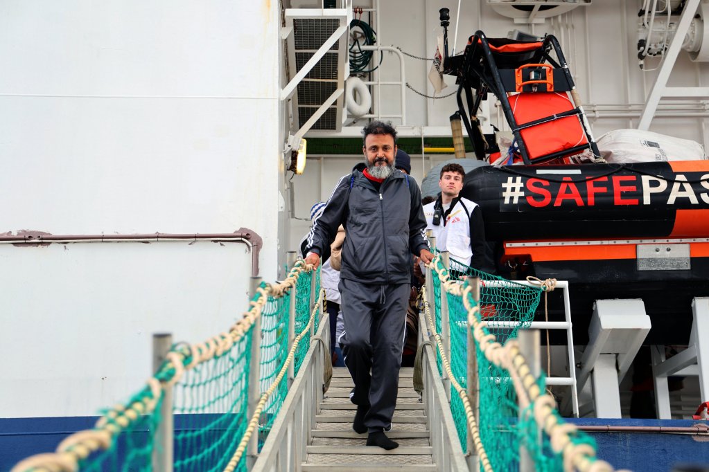 One of the 83 men and boys who were rescued by Geo Barents' crew on November 28 disembarks in Vibo Valentia | Photo: X @MSF_Sea
