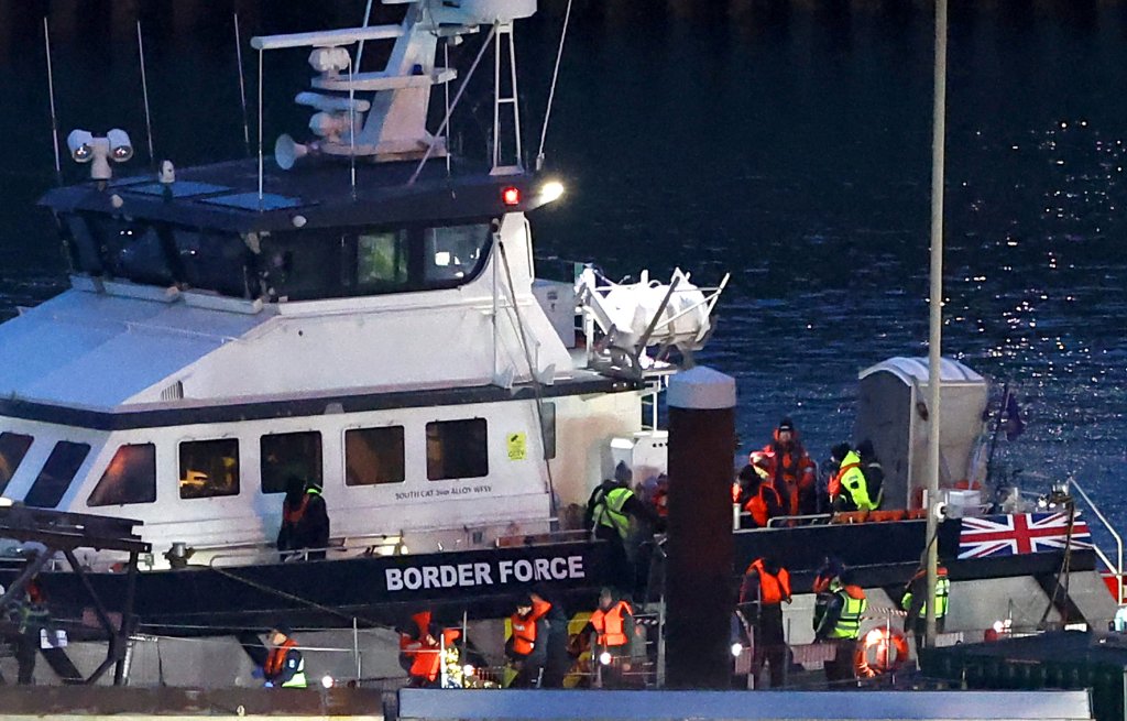 From file: The UK government has a huge backlog of asylum seeking applications to get through, which is why it hired additional staff to tackle this backlog | Photo: Toby Melville / Reuters